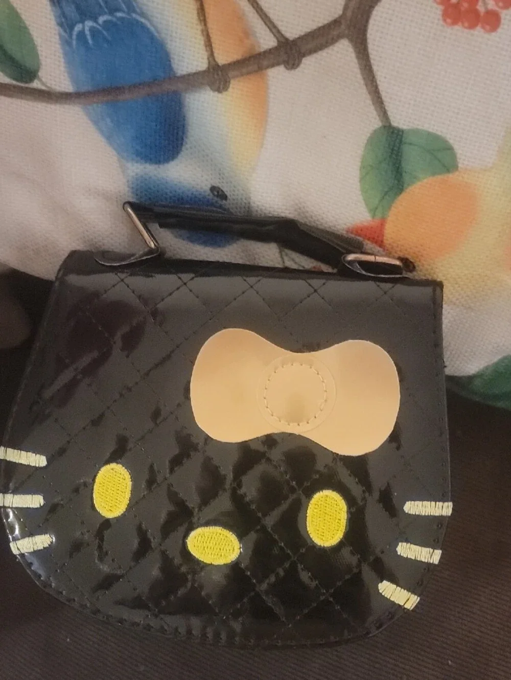 Hello Kitty Black Mini Purse with Gold Bow Accent